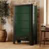 Poêle radiant électrique E40 S La Valmarecchia en céramique vert dans un salon chaleureux