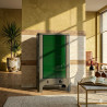 Poêle radiant électrique E40 SL La Valmarecchia en céramique vert dans un salon chaleureux